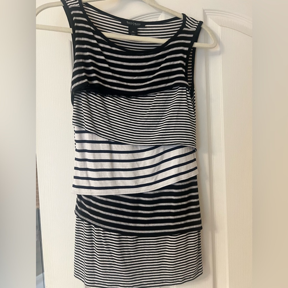 White House Black Market tank. Worn, but stretchy and soft. Size XS.
